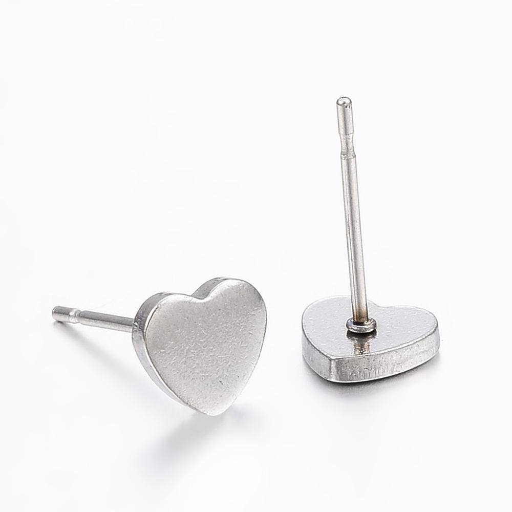 Silver heart-shaped earrings on a white background