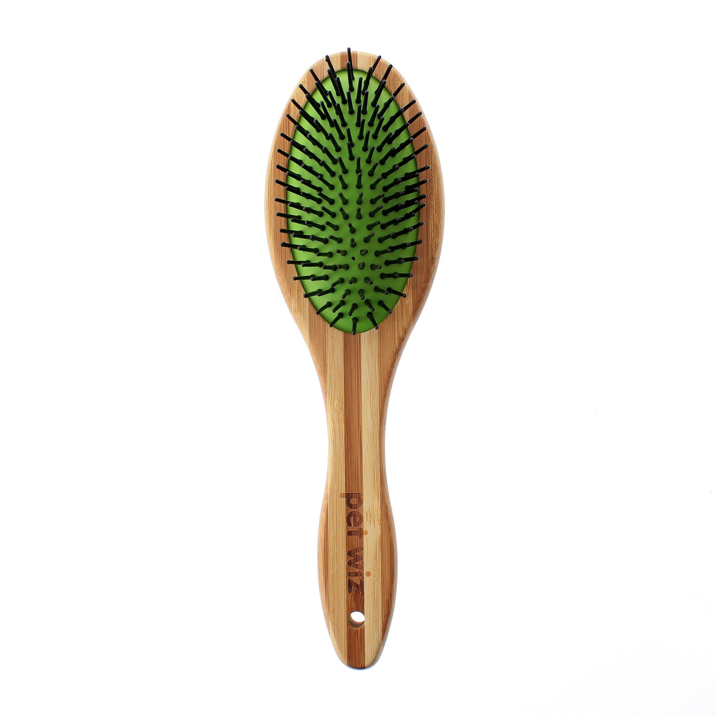 Wooden dog brush with green bristle head on a white background