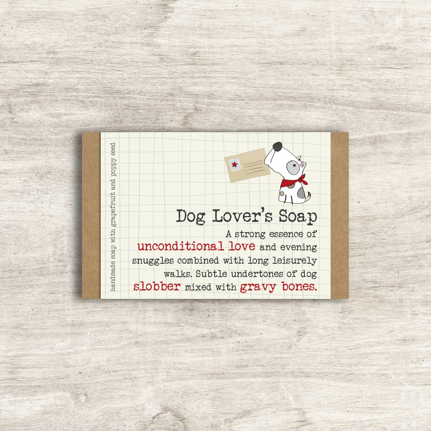 Dog Lover's Soap packaging with a cartoon dog holding a card on a wooden surface