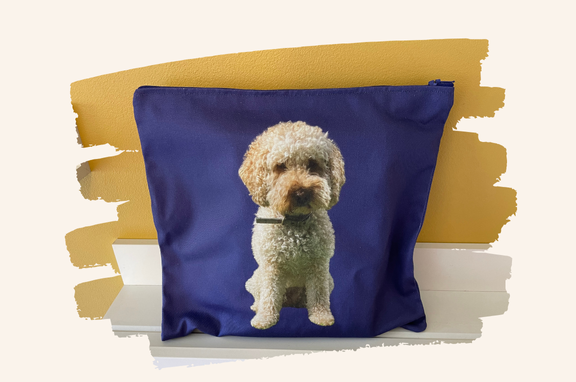 Blue bag with a dog design on a white background