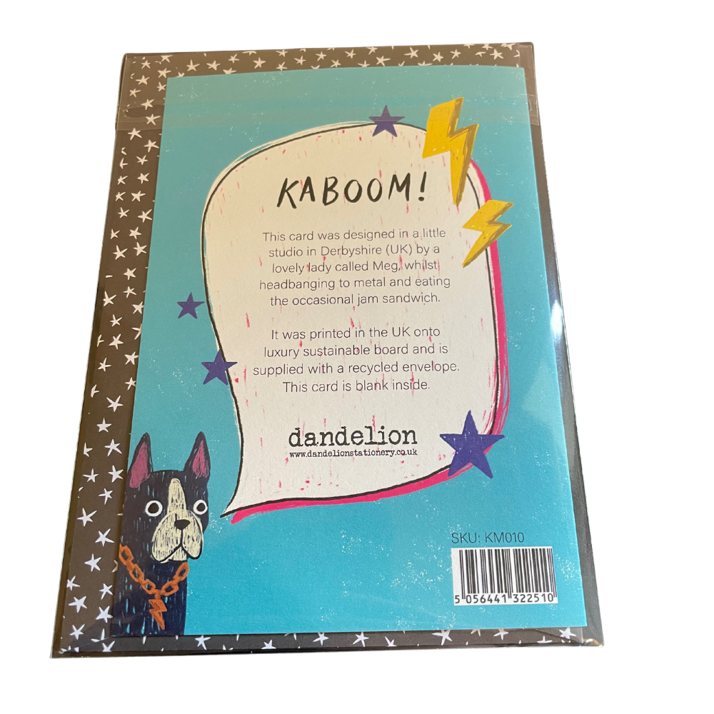 Back of a greeting card with 'Kaboom!' design, featuring a dog illustration and text about the card's creation.