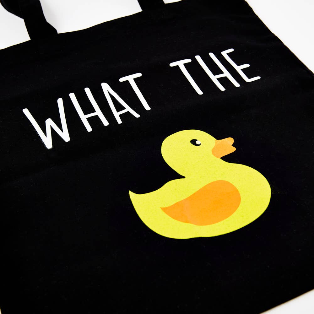 black tote bag close up with a duck image saying 'what the'.