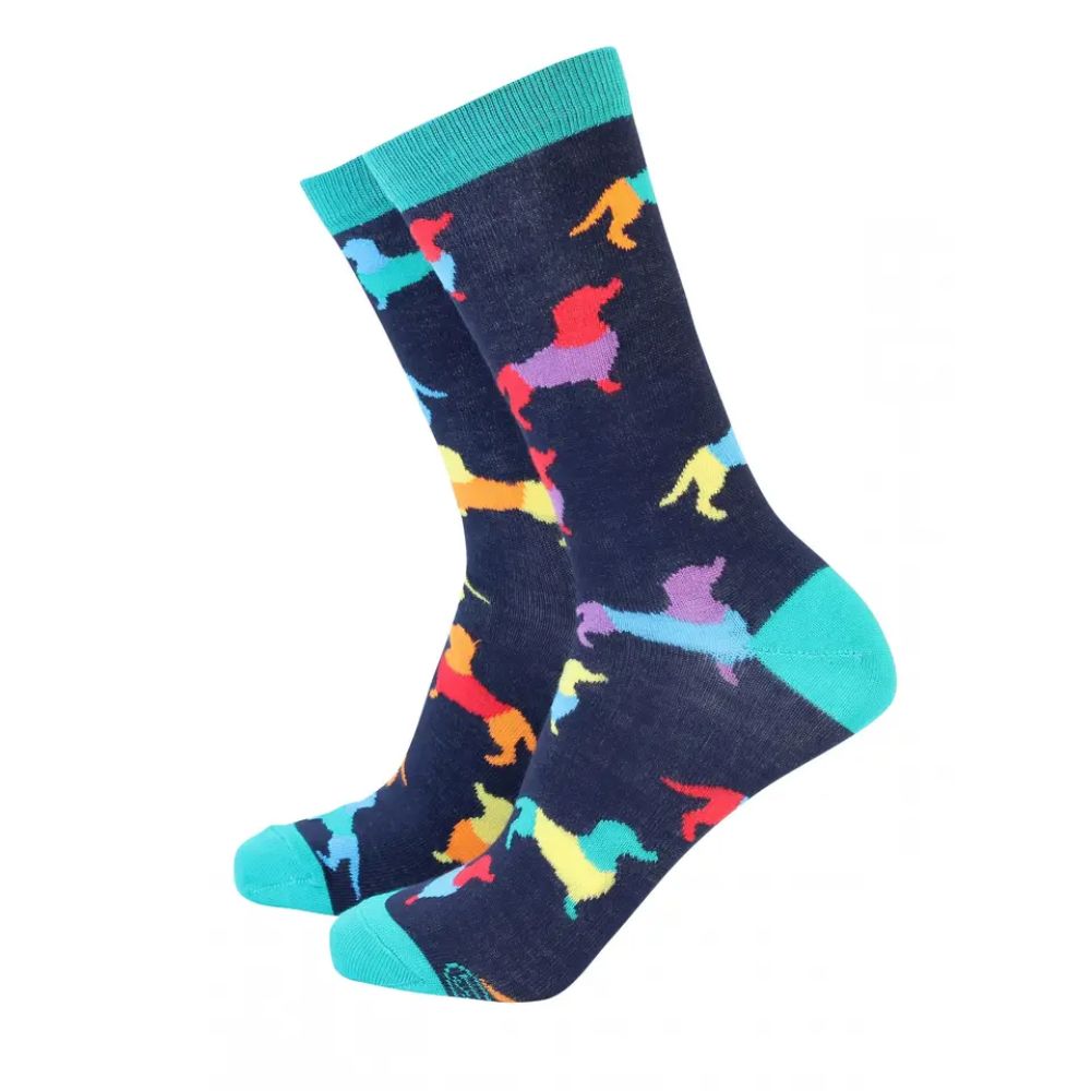 Colorful dog-patterned socks with teal accents on a white background