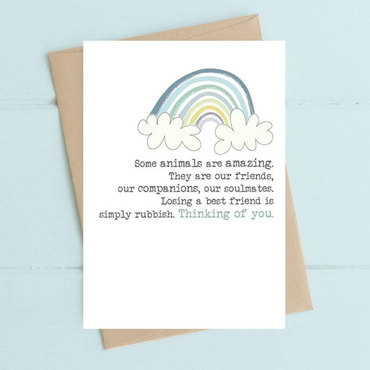 Greeting card with rainbow and text on a light blue background