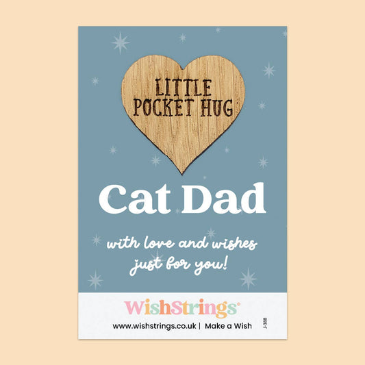 Card with wooden heart-shaped tag and text 'Cat Dad' on a blue background, branded 'WishStrings'.