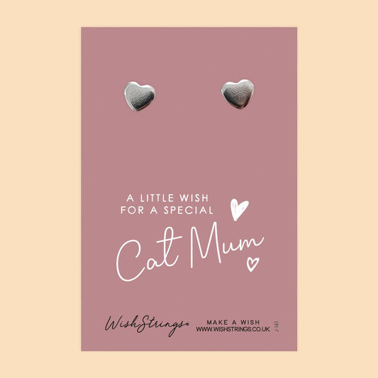 Heart-shaped earrings on a pink card with 'Cat Mum' message