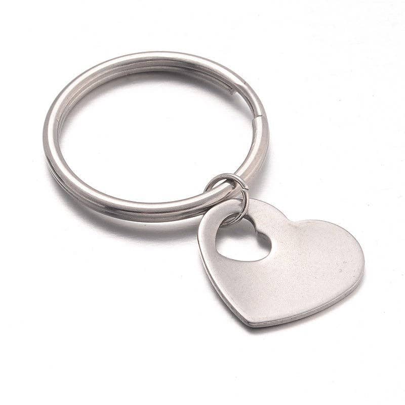 Silver keychain with a heart-shaped tag on a white background