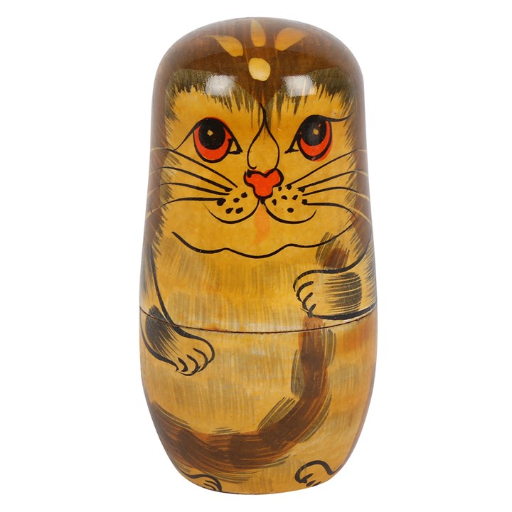 Wooden cat-shaped container with a white background
