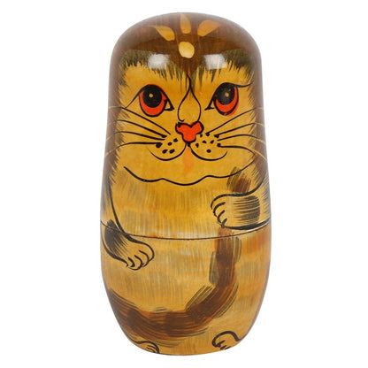 Wooden cat-shaped container with a white background