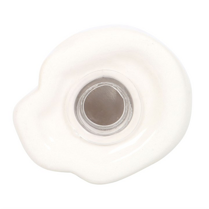 Bottom of a salt and pepper shaker