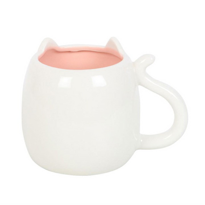 White cat-shaped mug with a pink interior on a white background