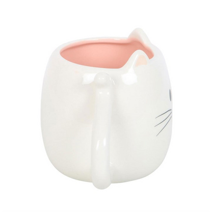 Cat-shaped ceramic mug with pink interior on a white background