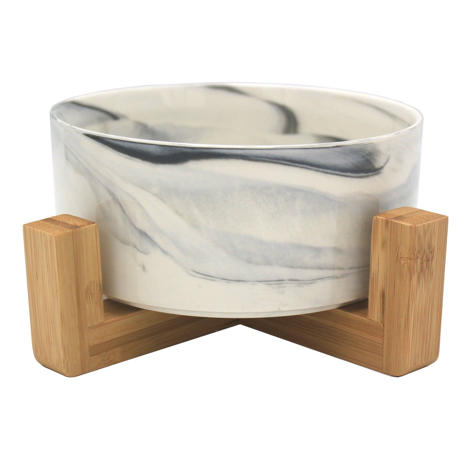 Marble-patterned bowl on a wooden stand with a white background