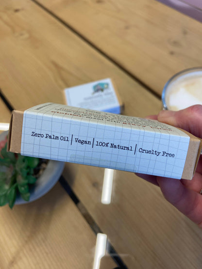 Product packaging with text on a wooden surface