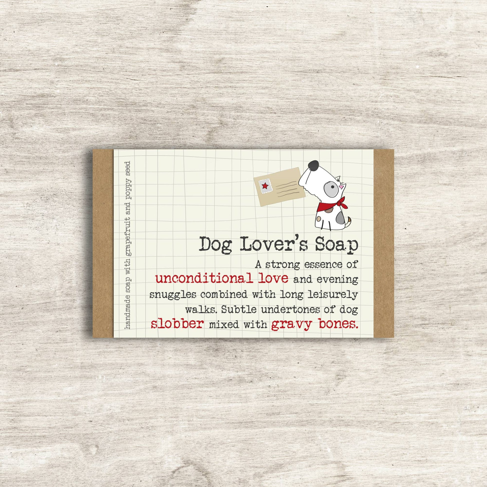 Dog Lover's Soap packaging with a cartoon dog holding a card on a wooden surface
