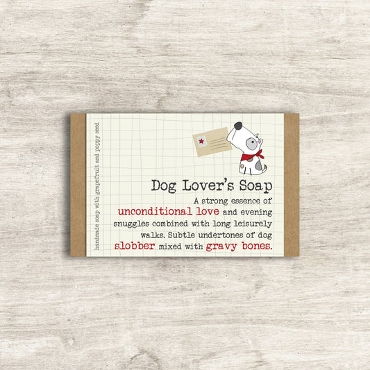 Dog Lover's Soap packaging with a cartoon dog holding a card on a wooden surface