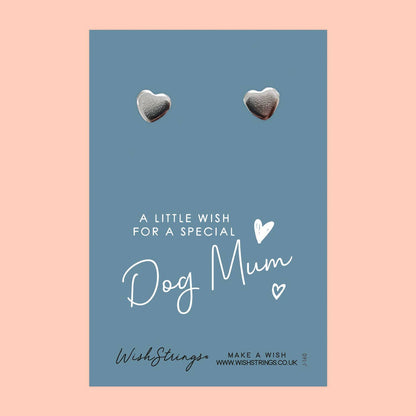 Heart-shaped earrings on a blue card with 'Dog Mum' text on a pink background