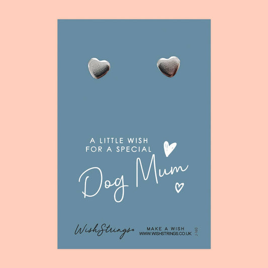 Heart-shaped earrings on a blue card with 'Dog Mum' text on a pink background