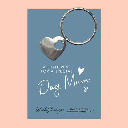 Heart-shaped keychain on a blue card with 'Dog Mum' text and WishStrings branding.