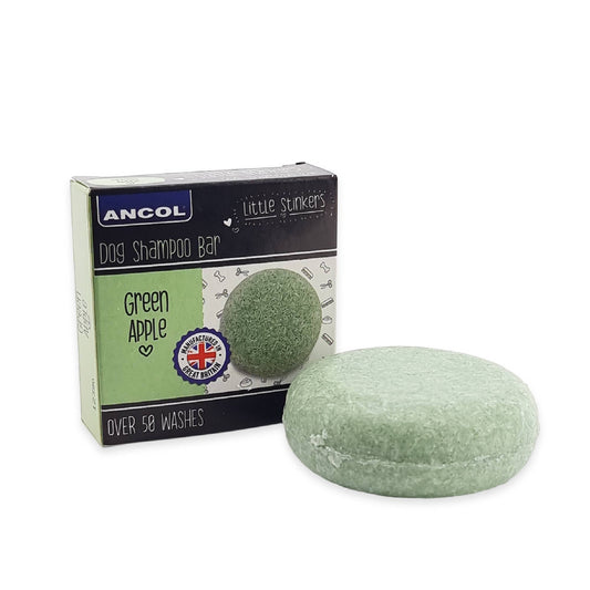 Green dog shampoo bar with packaging labeled 'Ancol' on a white background