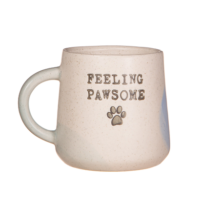 Ceramic mug with the quote 'feeling pawsome' on the front. 
