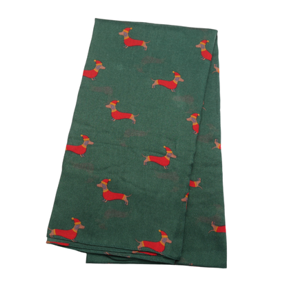 Green scarf with sausage dogs dressed in Christmas outfits.