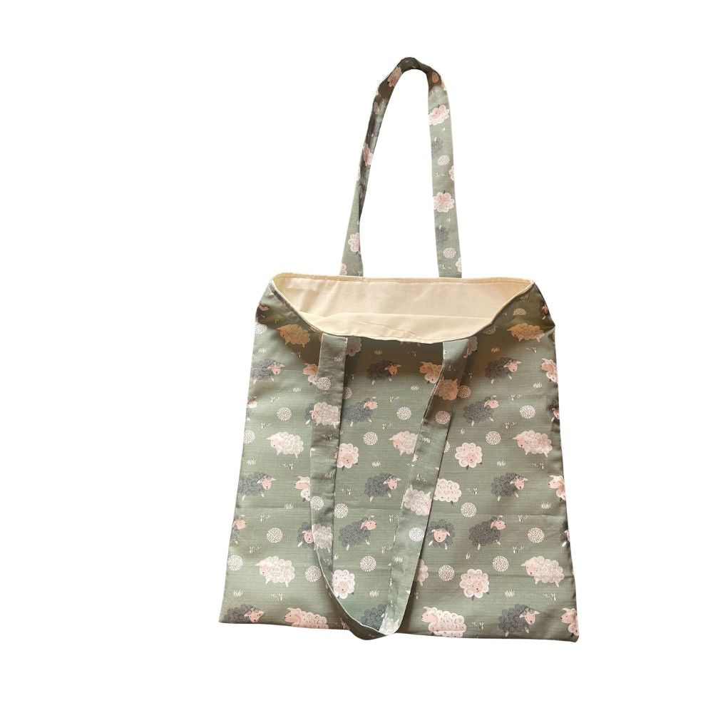 Sheep patterned tote bag on a white background