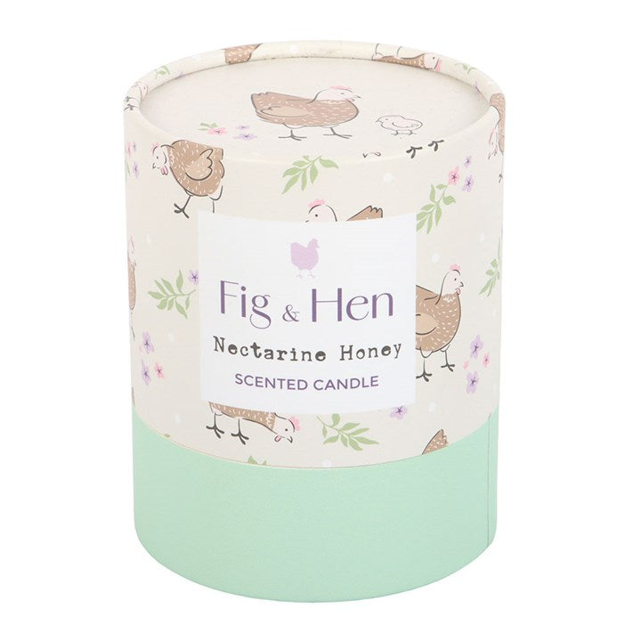 Scented candle with 'Fig & Hen' label on a white background