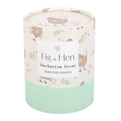 Scented candle with 'Fig & Hen' label on a white background