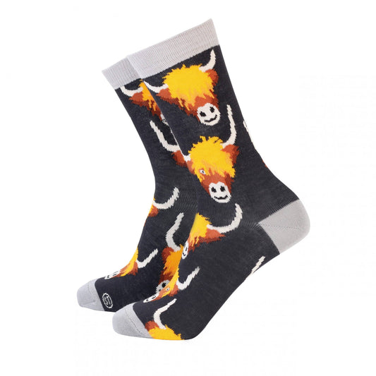 Socks with highland cow design on a white background