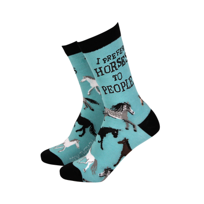 Teal socks with horse designs and text on a white background