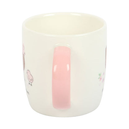 White mug with a pink accent on a white background