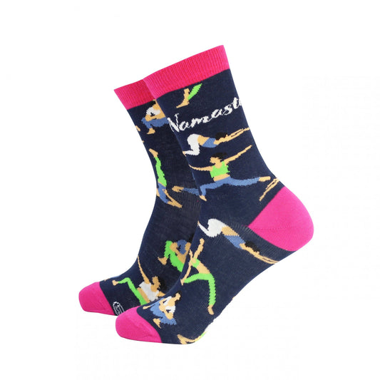 A pair of colorful bamboo socks with a yoga-inspired design, featuring various yoga poses and the word 'Namaste' in pink lettering on a navy background.