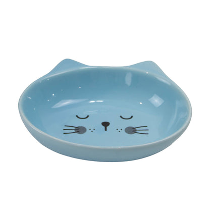 Blue ceramic cat bowl with a cute face design on a white background