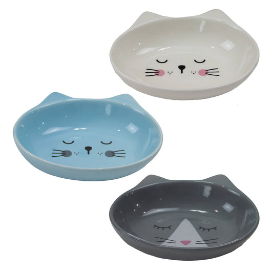 Three cat-shaped bowls in white, blue, and grey with cartoon faces on a white background.
