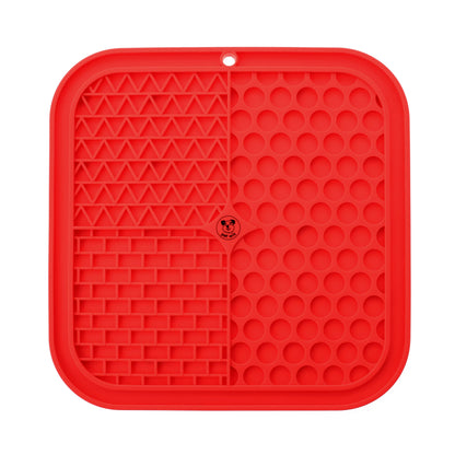 Red silicone pet licking mat on a white background