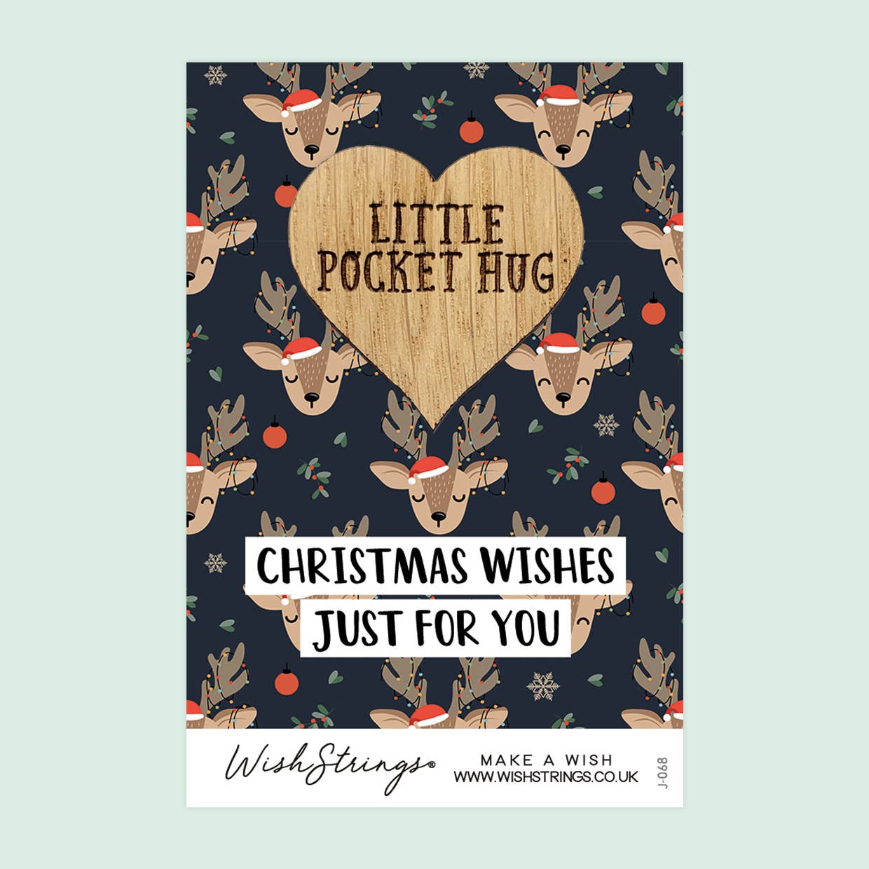 Christmas-themed card with reindeer and heart design on a blue background